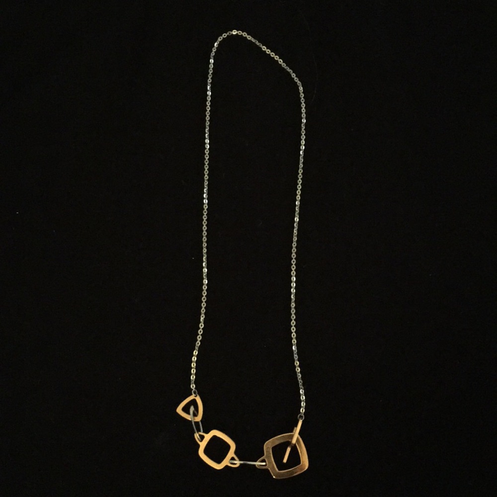 Kris gold and silver necklace